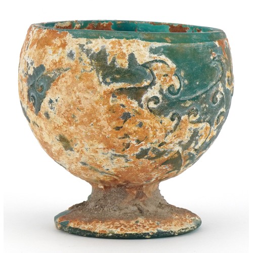 680 - Chinese turquoise glass goblet with relief decoration, 9cm high