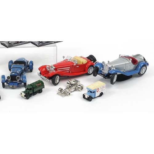 1163 - Group of collector's diecast vehicles and motorbikes including Burago and Maisto