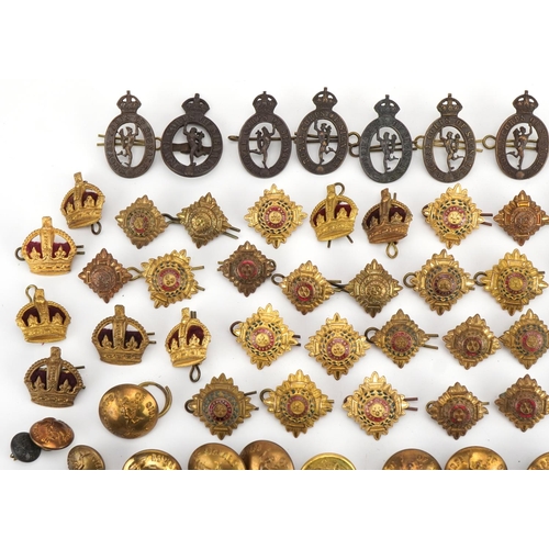 1382 - Collection of military interest Royal Corps of Signals buttons, pips and cap badges