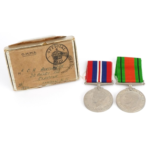 1362 - Two British military World War II medals with box of issue inscribed R C H Ainsworth