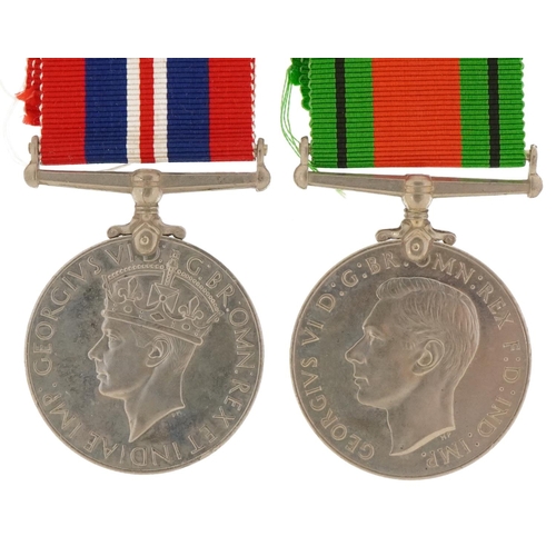 1362 - Two British military World War II medals with box of issue inscribed R C H Ainsworth