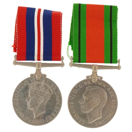 1362 - Two British military World War II medals with box of issue inscribed R C H Ainsworth