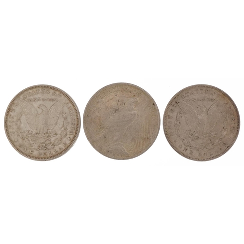 1571 - Three United States of America Liberty Head dollars, two 1890 and one 1924