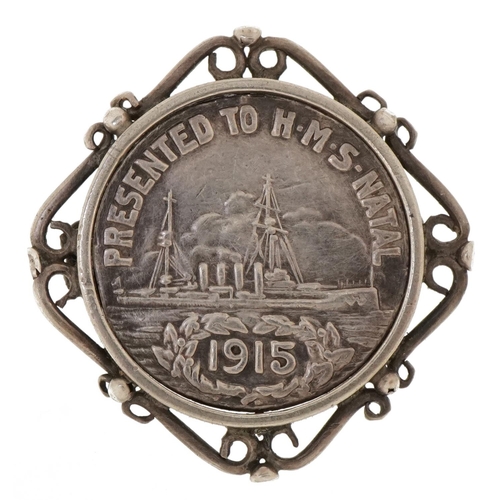 1376 - Military interest World War I white metal brooch housing a coin presented to HMS Natal 1915 from the... 