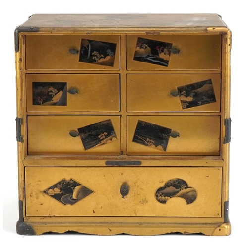 204 - Japanese maki-e lacquer table cabinet fitted with an arrangement of seven drawers finely painted wit... 