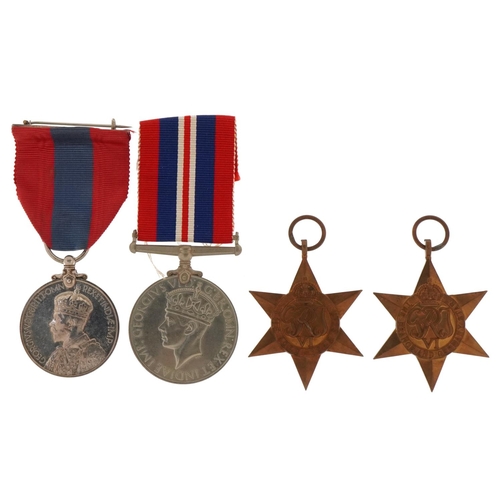 1365 - Three British military World War II medals and a George V Faithful Service medal with fitted case aw... 