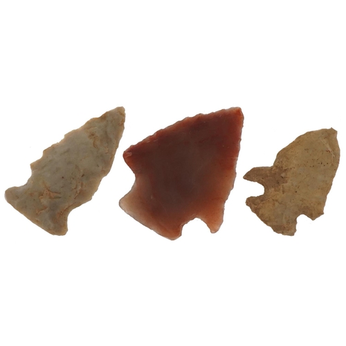 421 - Three Stone Age style carved flint arrowheads, the largest 4cm in length