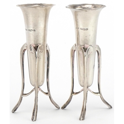 159 - Ridley Brothers & Merton, pair of Arts & Crafts silver three footed bud vases, Birmingham 1904, 9cm ... 