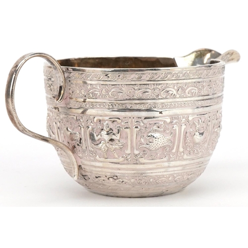 554 - Josiah Williams & Co, Victorian silver Indian design cream jug embossed with deities and animals, Lo... 