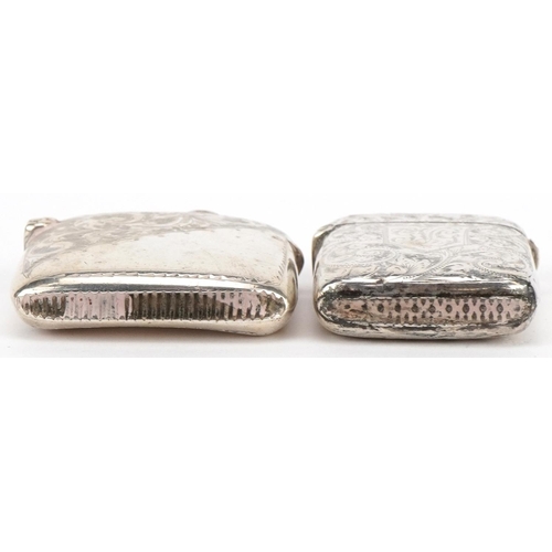 163 - Two Edwardian and later engraved silver vestas, the largest 4cm wide, total 43.8g