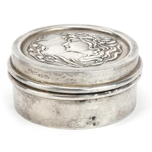 561 - Henry Matthews, Art Nouveau circular silver patch box, the hinged lid embossed with a maiden, Birmin... 