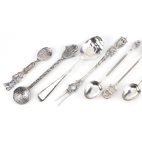 495 - Ten Georgian and later silver and white metal teaspoons and a pickle fork, including some Indian and... 