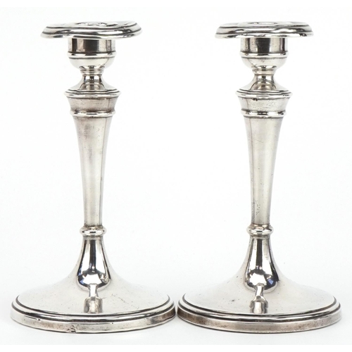 322 - Charles Boyton & Sons Ltd, pair of Edwardian silver tapering candlesticks, Birmingham 1908, 15cm hig... 