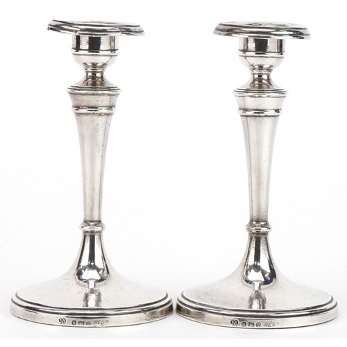 322 - Charles Boyton & Sons Ltd, pair of Edwardian silver tapering candlesticks, Birmingham 1908, 15cm hig... 