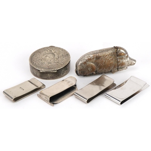 704 - Silver and white metal objects comprising Egyptian Revival money clip, Wilson Carolyn Begay money cl... 