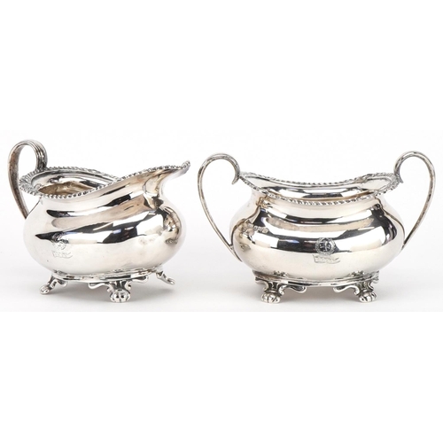 272 - Atkin Brothers, Edwardian silver cream jug and matching sugar bowl with twin handles, the largest 14... 