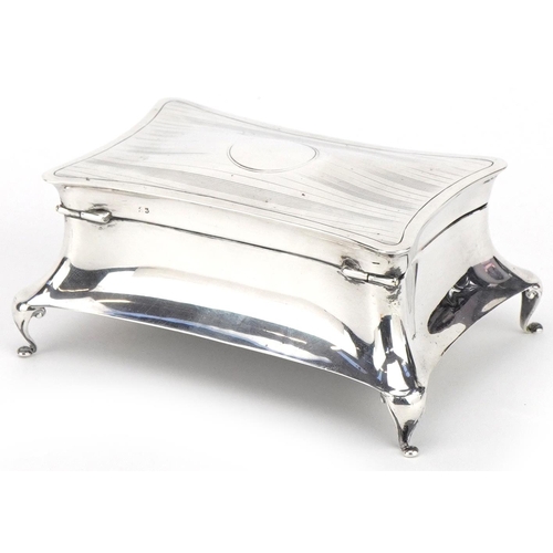 274 - Henry Williamson Ltd, Arts & Crafts silver four footed jewel box with hinged lid, Birmingham 1919, 1... 