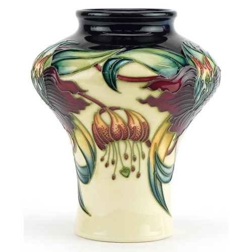 78 - Moorcroft pottery vase hand painted in the Anna Lilly pattern, 14cm high