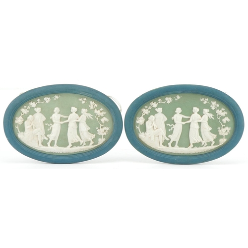 2622 - Pair of classical oval Jasperware wall plaques decorated in low relief with maidens, each 16cm wide