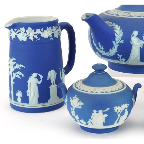 2295 - Wedgwood blue and white Jasperware decorated with classical Grecian females and Putti including teap... 