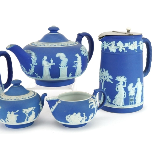 2295 - Wedgwood blue and white Jasperware decorated with classical Grecian females and Putti including teap... 