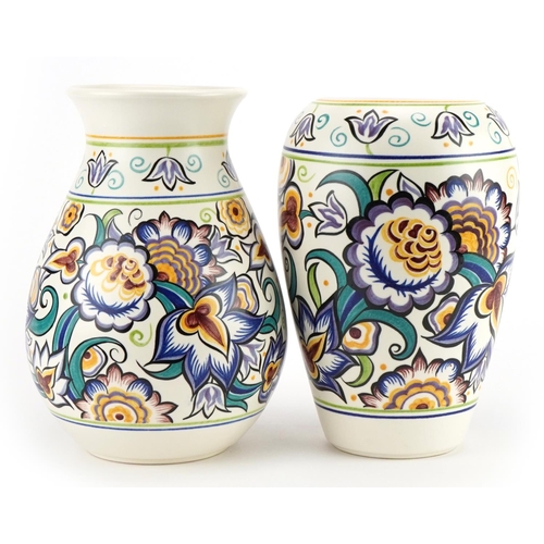 227 - Karen Brown for Poole Pottery, two Mid century studio vases hand painted with stylised flowers in th... 