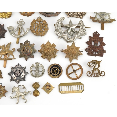 1384 - Military interest cap badges including South Staffordshire, The Royal Regiment of Canada and Scottis... 