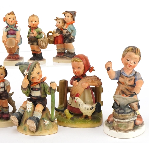 2266 - Collection of Goebel Hummel figures including Mountaineer, Signs of Spring and Little Helper, the la... 