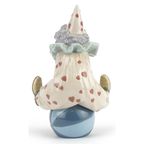 2249 - Lladro clown figure Having a Ball, numbered 5813, 18cm high