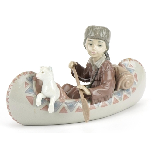 2251 - Lladro figure group of a boy with dog in a canoe, Little Explorer, numbered 6640, 25cm in length