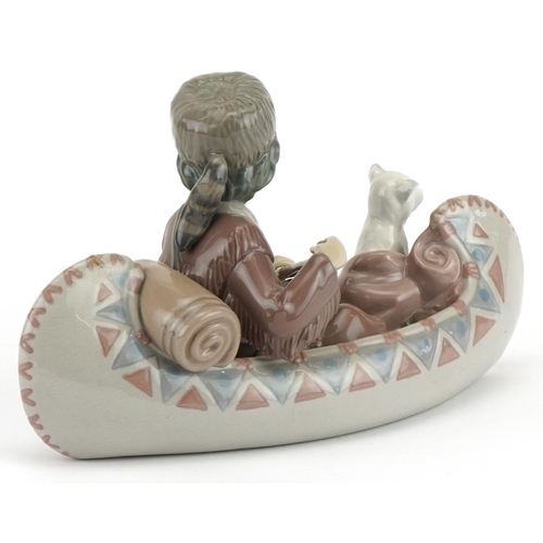 2251 - Lladro figure group of a boy with dog in a canoe, Little Explorer, numbered 6640, 25cm in length