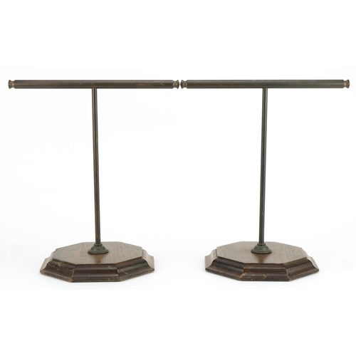 2671 - Pair of mahogany and bronzed display stands on octagonal bases, each 35.5cm high