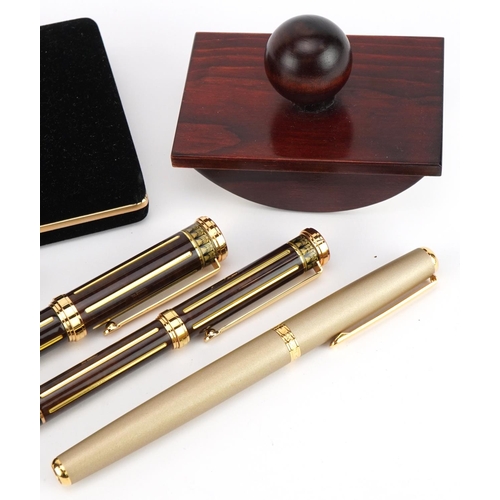 2507 - Pens and writing accessories including hardwood blotter, Buckingham Palace limited edition enamelled... 