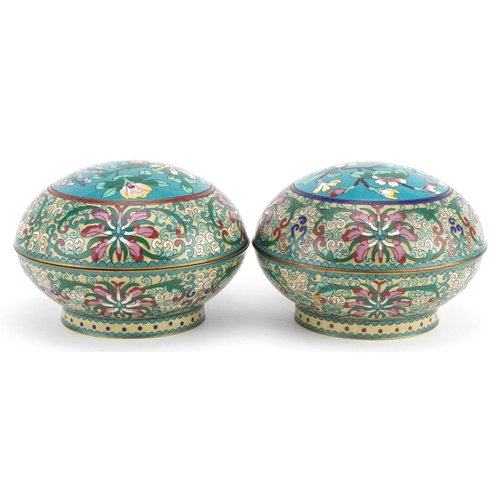 28 - Matched pair of Chinese cloisonne bun boxes and covers finely enamelled with flowers, each 15cm in d... 