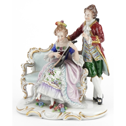 252 - 19th century Neapolitan porcelain group in the form of a lady playing a mandolin with tutor watching... 