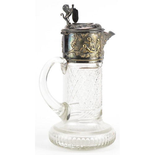 178 - 19th century cut glass claret jug with silver plated mounts embossed with a Bacchanalian scene surmo... 