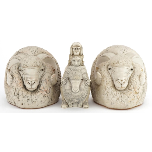 2473 - Pair of mid century style stylised ram's head design bookends and a similar figure group, the larges... 