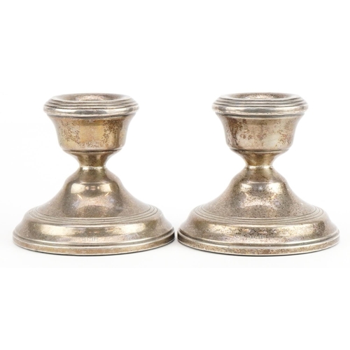 325 - W I Broadway & Co, pair of Elizabeth II circular silver dwarf candlesticks, Birmingham 1970, 7cm in ... 