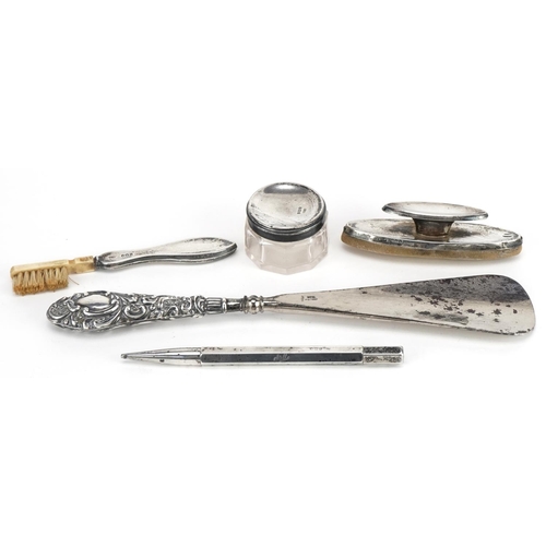 632 - Edwardian and later silver objects including a propelling pencil, ink blotter and shoehorn with stee... 