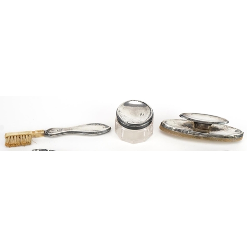 632 - Edwardian and later silver objects including a propelling pencil, ink blotter and shoehorn with stee... 