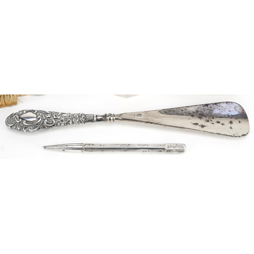 632 - Edwardian and later silver objects including a propelling pencil, ink blotter and shoehorn with stee... 