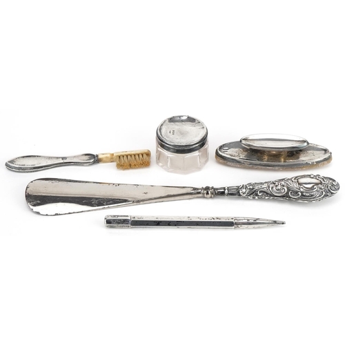 632 - Edwardian and later silver objects including a propelling pencil, ink blotter and shoehorn with stee... 