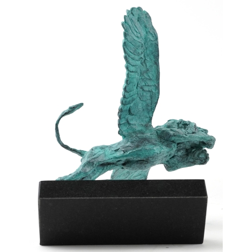 545 - Mark Coreth for McArthur Glen Group, Verdigris bronze statue of a winged lion raised on a slate base... 