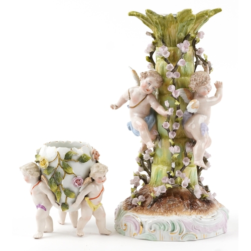 248 - Plaue, German floral encrusted porcelain centrepiece surmounted with three Putti and a similar flora... 