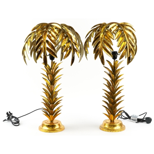 175 - Pair of Hollywood Regency style gilt painted table lamps in the form of palm trees, each 75cm high