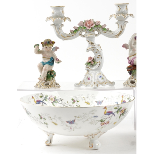 2485 - Continental and English porcelain including Dresden Lace figurine, three figures of Putti, Meissen s... 