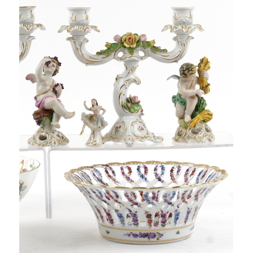 2485 - Continental and English porcelain including Dresden Lace figurine, three figures of Putti, Meissen s... 