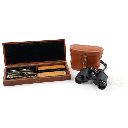 2481 - 19th century mahogany cased drawing set housing various brass implements and boxwood rules together ... 