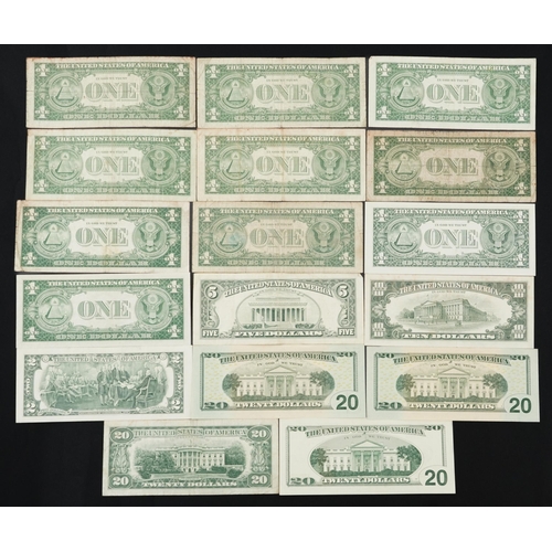 1622 - United States of America dollar banknotes, various series and serial numbers including one, two, fiv... 