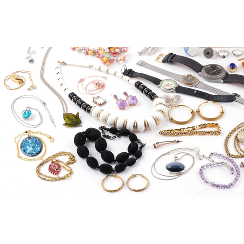 3718 - Vintage and later costume jewellery and wristwatches, some silver, including jewelled brooches, ring... 